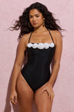 Susy Black Halter-Neck Swimsuit With White Corsages