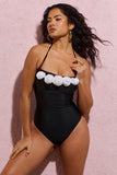 Susy Black Halter-Neck Swimsuit With White Corsages