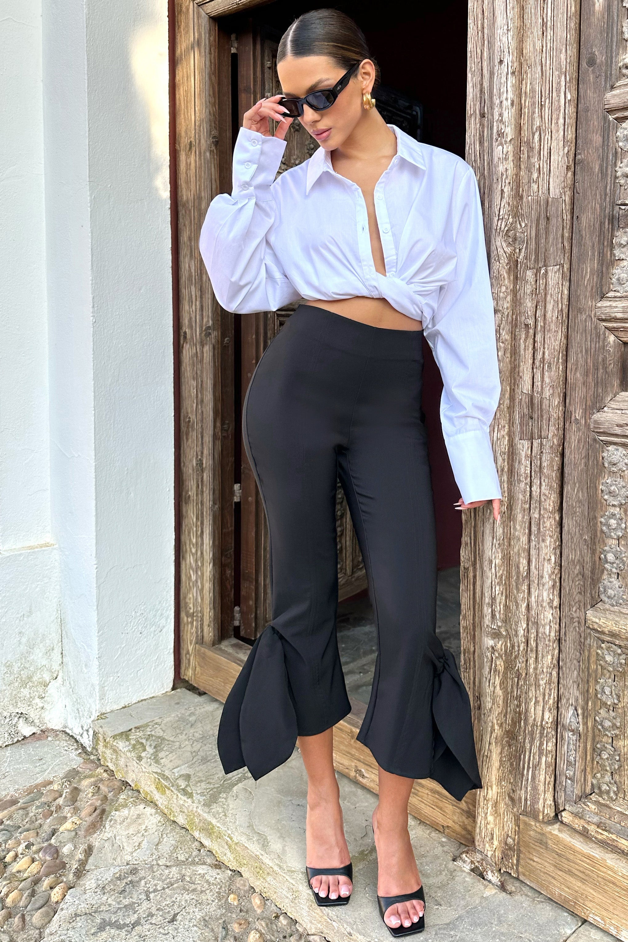 On Stage Black Cropped Capri Pants With Knot Detail