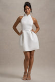 Dottie White High-Neck Mini Dress With Pleated Skirt