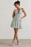 Verde Polka Dot V-Neck Ruched Mini Dress With Flared Hem